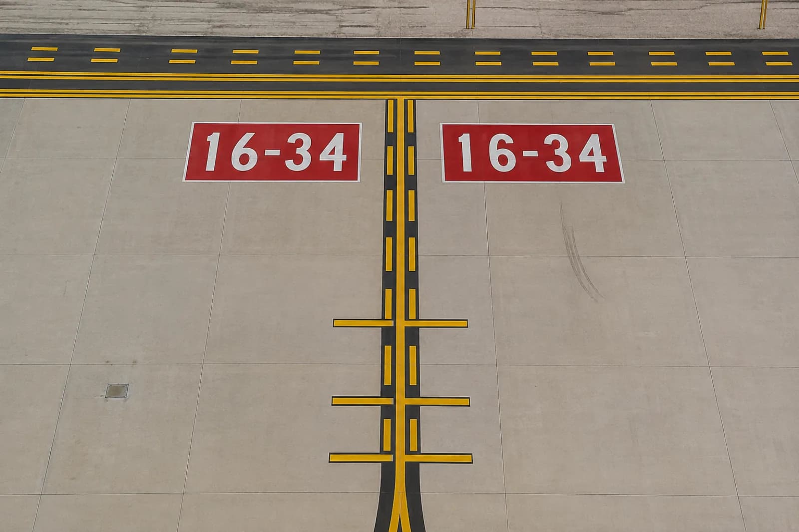 Airfield holding-position markings — runway and taxiway paint guide