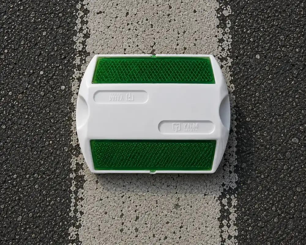 Green Road Stud Manufacturers - YNM Safety Road Safety Furniture | Road Safety Equipment India
