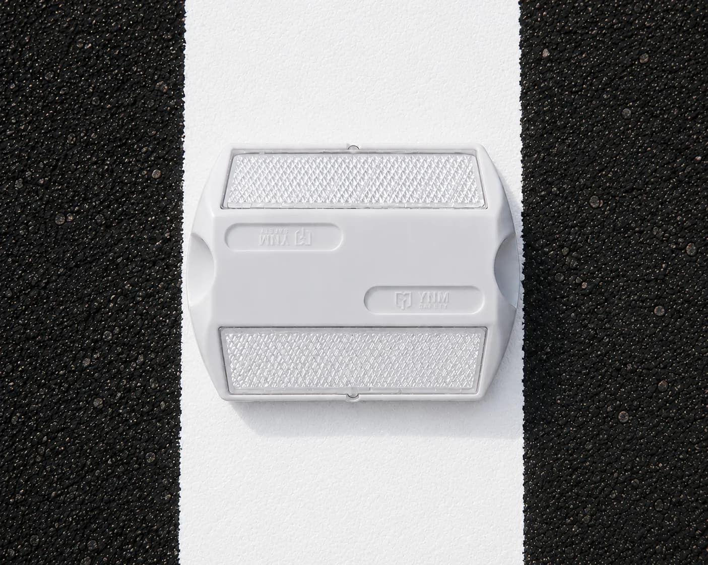 Road safety furniture — road studs, spring posts, median markers, solar blinkers — YNM Safety