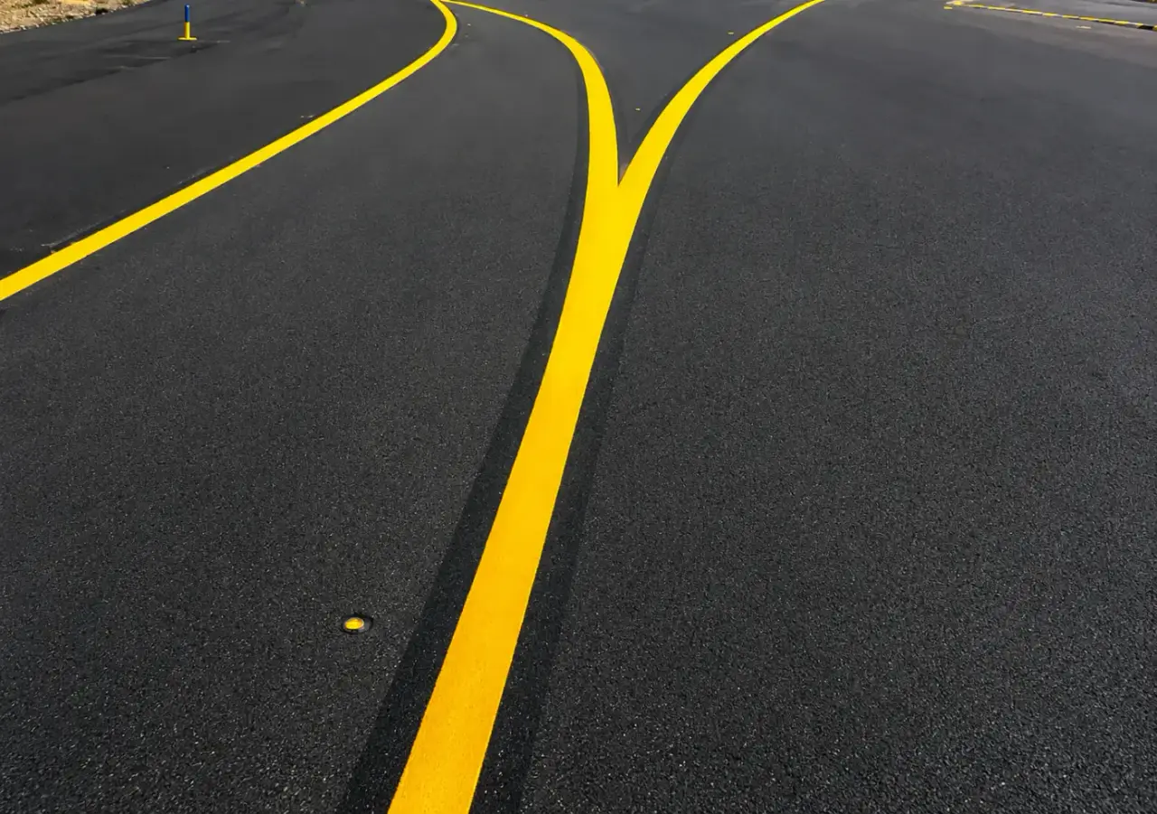 Comparing MMA cold plastic and waterborne airfield paint on taxiway pavement